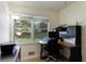 Small home office featuring large window and a computer workstation at 3060 Wilson Rd, Decatur, GA 30033