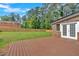 Large, fenced backyard with a wooden deck, perfect for outdoor entertaining at 4129 Pepperdine Dr, Decatur, GA 30034