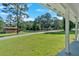 View of the neighborhood from the front porch of a home with a well-kept lawn at 4129 Pepperdine Dr, Decatur, GA 30034