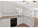 Bright kitchen featuring white cabinets and granite countertops at 4129 Pepperdine Dr, Decatur, GA 30034