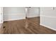 Spacious living room featuring beautiful hardwood floors and neutral paint tones at 4129 Pepperdine Dr, Decatur, GA 30034