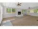Sun room featuring a fireplace and large windows at 4129 Pepperdine Dr, Decatur, GA 30034