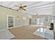 Sun room featuring a fireplace and multiple windows at 4129 Pepperdine Dr, Decatur, GA 30034