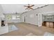 Spacious sun room with ample natural light and a cozy fireplace at 4129 Pepperdine Dr, Decatur, GA 30034