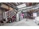 Unfinished basement offers ample storage space with stairs, utilities, and a convenient entrance at 725 Glengary Ne Way, Atlanta, GA 30342
