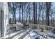 Relax on this spacious outdoor deck with a grill and ample seating, ideal for entertaining and enjoying nature at 725 Glengary Ne Way, Atlanta, GA 30342
