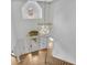 Grand foyer featuring a large decorative light fixture and hardwood flooring at 1025 Saint Marks Walk, Suwanee, GA 30024