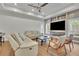 Spacious living room features a fireplace, recessed lighting and modern furniture at 1025 Saint Marks Walk, Suwanee, GA 30024