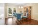 Charming dining room with hardwood floors, a china cabinet and view to outside at 3147 Buford Ne Hwy # 2, Atlanta, GA 30329
