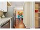 Galley kitchen with stainless steel appliances and a view into the dining room at 3147 Buford Ne Hwy # 2, Atlanta, GA 30329