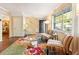 Spacious living room with hardwood floors and a comfortable seating area with a large window at 3147 Buford Ne Hwy # 2, Atlanta, GA 30329