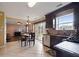 Well-equipped kitchen featuring stainless steel appliances, dark wood cabinets, and tile backsplash at 3235 Northcliff Dr, Suwanee, GA 30024
