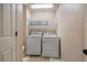 Convenient laundry room with side-by-side washer and dryer hookups at 3235 Northcliff Dr, Suwanee, GA 30024