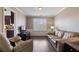 Comfortable living room with hardwood floors and ample seating at 3235 Northcliff Dr, Suwanee, GA 30024