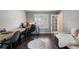 Home office with hardwood flooring, work space and serene natural light at 3235 Northcliff Dr, Suwanee, GA 30024