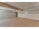 Spacious unfinished basement with tile flooring and a neutral color palette at 5567 Stapleton Dr, Dunwoody, GA 30338