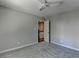 This cozy bedroom features soft carpet, neutral walls, and a modern ceiling fan at 5567 Stapleton Dr, Dunwoody, GA 30338
