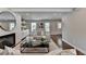 Open layout living room featuring hardwood floors, and fireplace at 5567 Stapleton Dr, Dunwoody, GA 30338