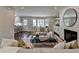 Inviting living room with fireplace, large windows and hardwood floors, perfect for relaxing and entertaining at 5567 Stapleton Dr, Dunwoody, GA 30338