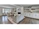 Spacious living room features hardwood floors, fireplace, built-in shelves, and large windows at 5567 Stapleton Dr, Dunwoody, GA 30338