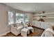Comfortable living area with built-ins, large windows and backyard views at 5567 Stapleton Dr, Dunwoody, GA 30338