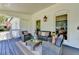 Cozy covered porch featuring comfortable seating and classic architectural details, perfect for outdoor relaxation at 5567 Stapleton Dr, Dunwoody, GA 30338