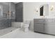 Modern bathroom with gray subway tile in shower and sleek gray vanity with white countertop at 56 Pine St, Roswell, GA 30075