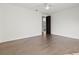 Spacious bedroom with wood floors and a ceiling fan at 56 Pine St, Roswell, GA 30075