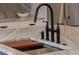 Granite countertop and sink with a modern faucet at 56 Pine St, Roswell, GA 30075