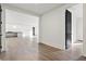 Open-concept living area with hardwood floors and natural light, perfect for entertaining and Gathering gatherings at 56 Pine St, Roswell, GA 30075
