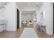 Open-concept living room with hardwood floors, and an archway to additional living space at 56 Pine St, Roswell, GA 30075