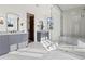 Elegant main bathroom featuring double vanity sinks, and a large glass shower at 56 Pine St, Roswell, GA 30075