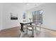 Bright home office featuring hardwood floors, large windows, and modern decor at 56 Pine St, Roswell, GA 30075