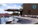 A modern pool with lounge chairs, umbrella, and garden for relaxation and recreation at 56 Pine St, Roswell, GA 30075