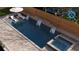 Aerial view of a refreshing swimming pool with hot tub and waterfall features at 56 Pine St, Roswell, GA 30075