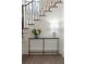 Close-up of staircase with custom metal railing and decor at 56 Pine St, Roswell, GA 30075