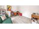 Versatile room with light gray hardwood flooring and ample space, decorated with eclectic items at 959 Vendue Dr, Lawrenceville, GA 30044