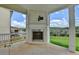 Outdoor covered patio includes an outdoor fireplace at 1620 Branthaven Ln, Auburn, GA 30011