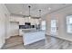 Charming kitchen with an island, stainless steel appliances, and ample cabinet space at 1620 Branthaven Ln, Auburn, GA 30011