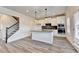 Bright kitchen with an island, stainless steel appliances, and plenty of natural light at 1620 Branthaven Ln, Auburn, GA 30011