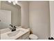 Tastefully designed powder room with elegant fixtures and modern vanity at 1620 Branthaven Ln, Auburn, GA 30011
