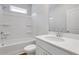Bathroom with a single sink vanity and white fixtures, including a shower-tub combo at 1768 Evenstad Way, Smyrna, GA 30080