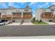 Townhome exterior showcases garages and decks, offering modern living with outdoor space at 1768 Evenstad Way, Smyrna, GA 30080