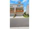 Townhome exterior showcasing garages and decks, offering modern living with outdoor space at 1768 Evenstad Way, Smyrna, GA 30080