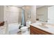 Cozy bathroom with tub, shower and vanity, perfect for guests or a Gathering at 2041 Democracy Dr, Buford, GA 30519