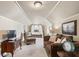 Cozy bedroom featuring a canopy bed, sitting area, and neutral walls at 2041 Democracy Dr, Buford, GA 30519