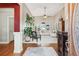 Elegant foyer featuring hardwood floors, high ceilings, and an open view into the living area at 2041 Democracy Dr, Buford, GA 30519