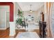 Elegant foyer with hardwood floors, high ceilings, and a glimpse into the spacious living area at 2041 Democracy Dr, Buford, GA 30519