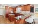 Beautiful kitchen featuring granite countertops, stainless steel appliances, and wood floors at 2041 Democracy Dr, Buford, GA 30519