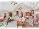 Bright living room featuring vaulted ceilings, wood floors, and an open floor plan at 2041 Democracy Dr, Buford, GA 30519